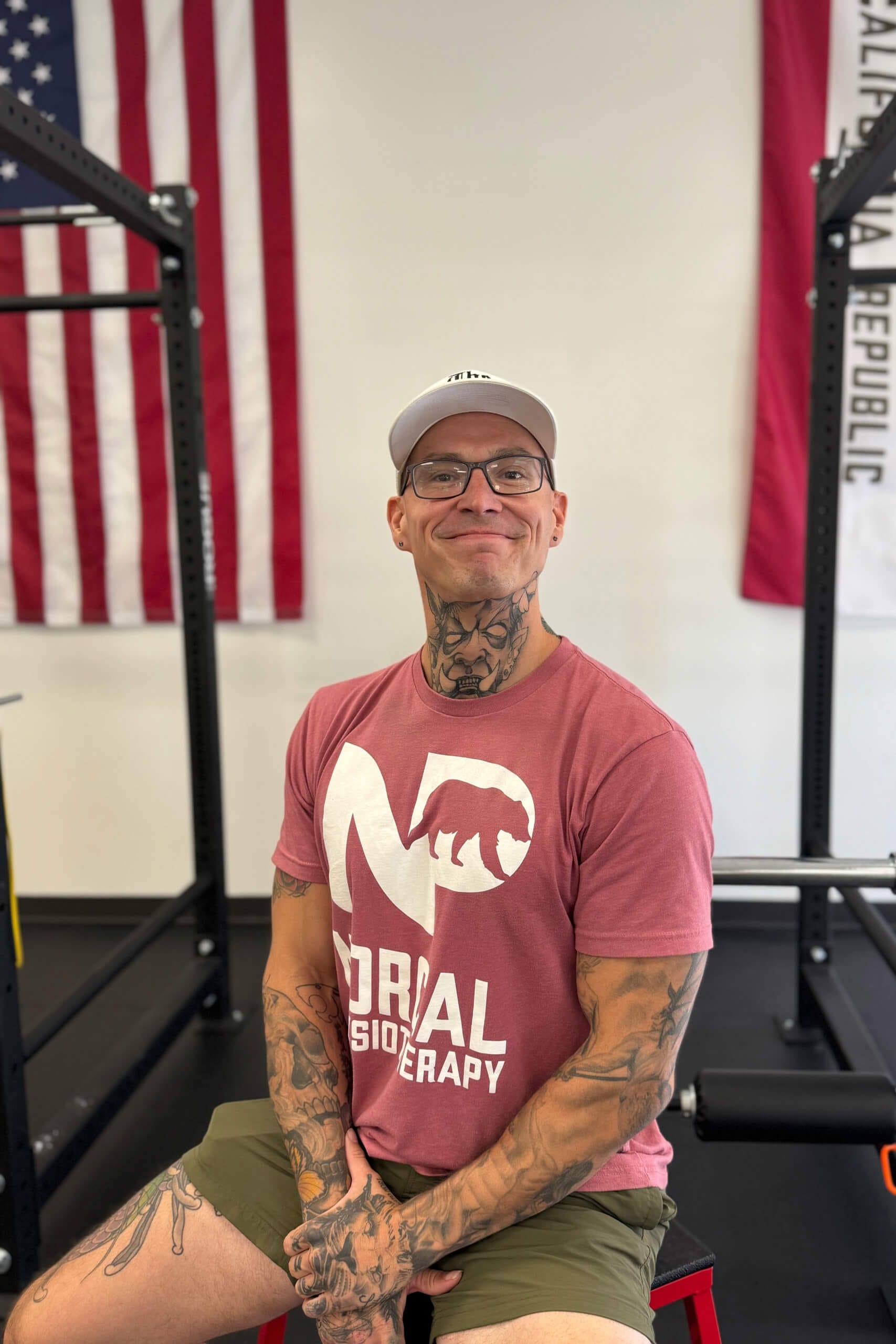 Calvin Kenan seated in the gym